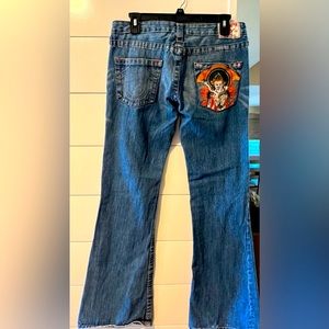 True Religion Embroidered Buddha Bell Bottom Jean Size 29 in medium stone wash.